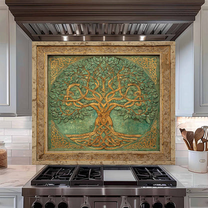Decorative backsplash with a tree design above a stove in a kitchen.