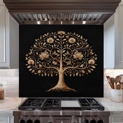 Tempered glass backsplash with a tree design above a stove in a kitchen.
