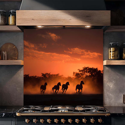 Kitchen stove with a decorative backsplash of horses running at sunset