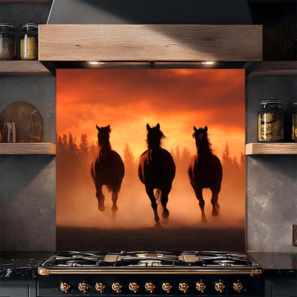 Kitchen stove with a decorative backsplash featuring three horses running at sunset.