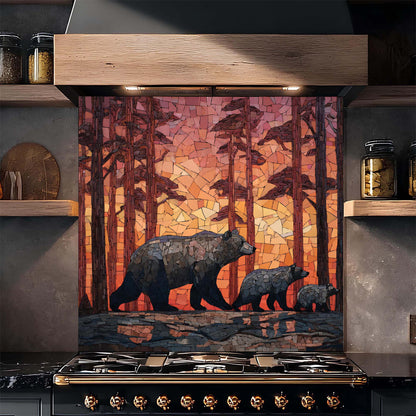 Stainless steel stove with a decorative glass backsplash featuring bears in a forest design.