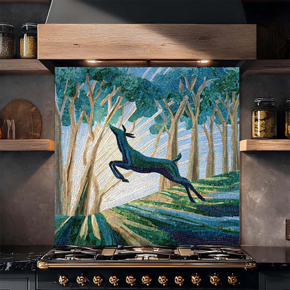 Decorative backsplash with a deer in a forest design above a stove.