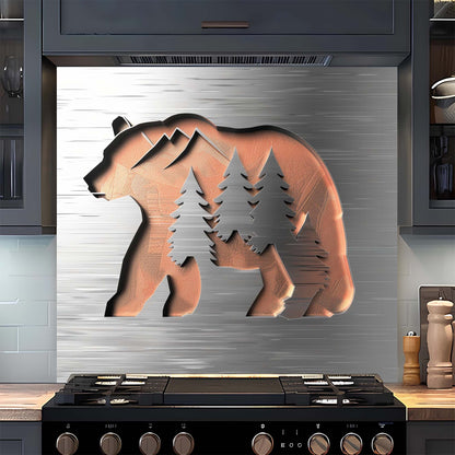 Decorative backsplash with bear and trees design on a kitchen wall.