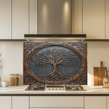 Decorative glass backsplash with tree design above a kitchen stove