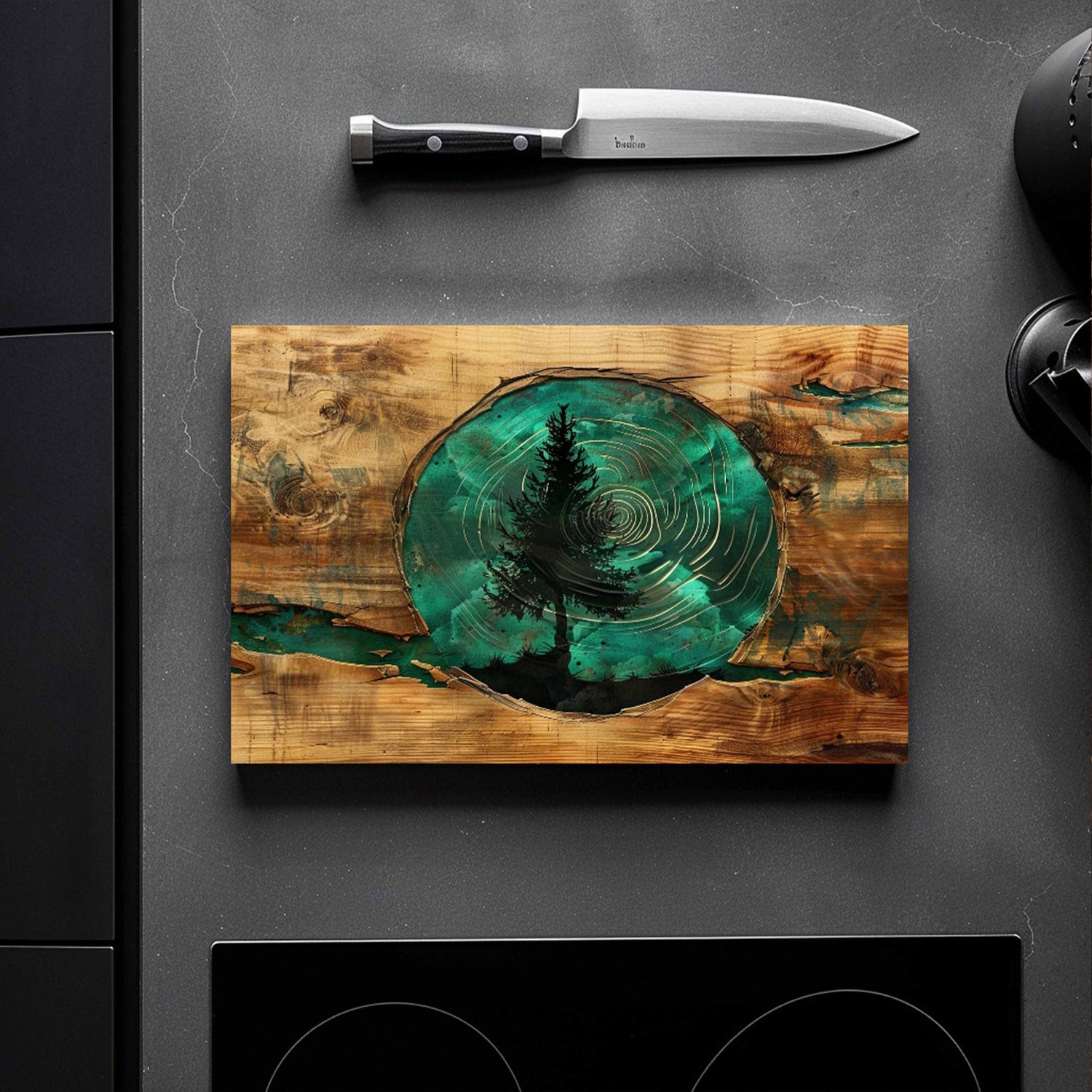 Wooden look glass cutting board with tree ring design on a dark surface with a knife.