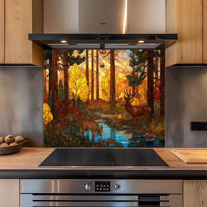 Kitchen with a decorative glass splashback featuring a forest scene with deer.