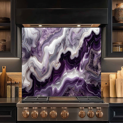 Stainless steel stove with a purple and white marbled backsplash in a kitchen setting.