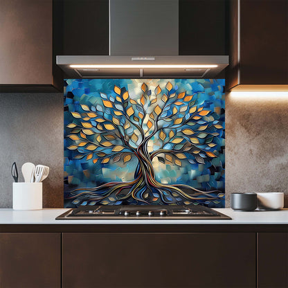 Kitchen with a decorative glass backsplash featuring a tree design.