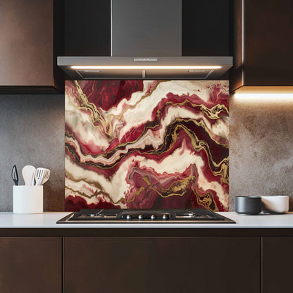 Kitchen with a decorative backsplash featuring red and gold marbled pattern.