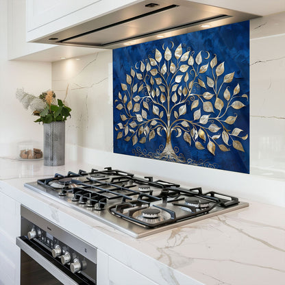 Modern kitchen with a gas stove and decorative backsplash featuring a tree design.