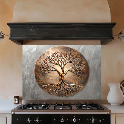 Decorative copper tree backsplash above a stove in a kitchen.