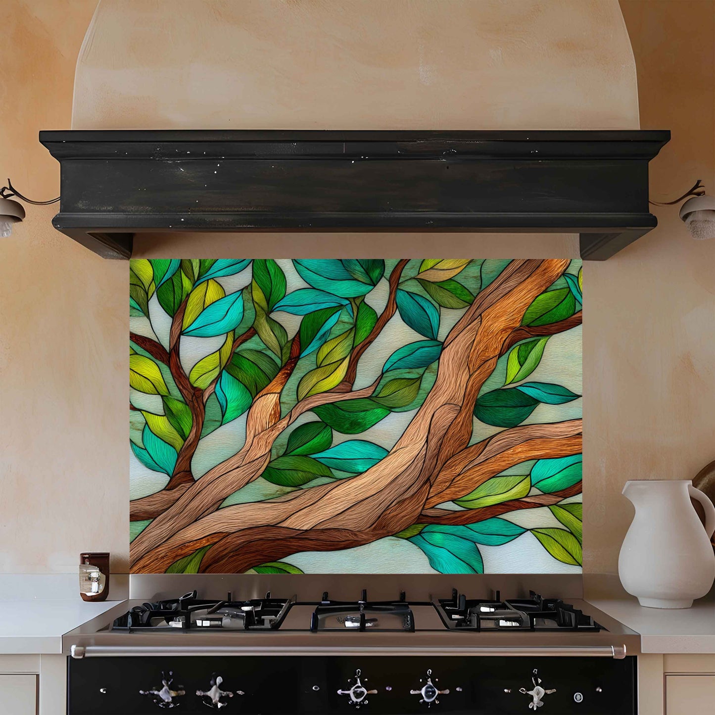 Kitchen with a decorative glass panel featuring tree design above a stove.