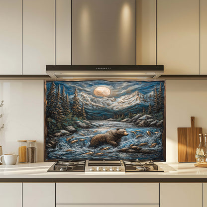 Kitchen with a tempered glass backsplash featuring a bear and nature scene above a stove.