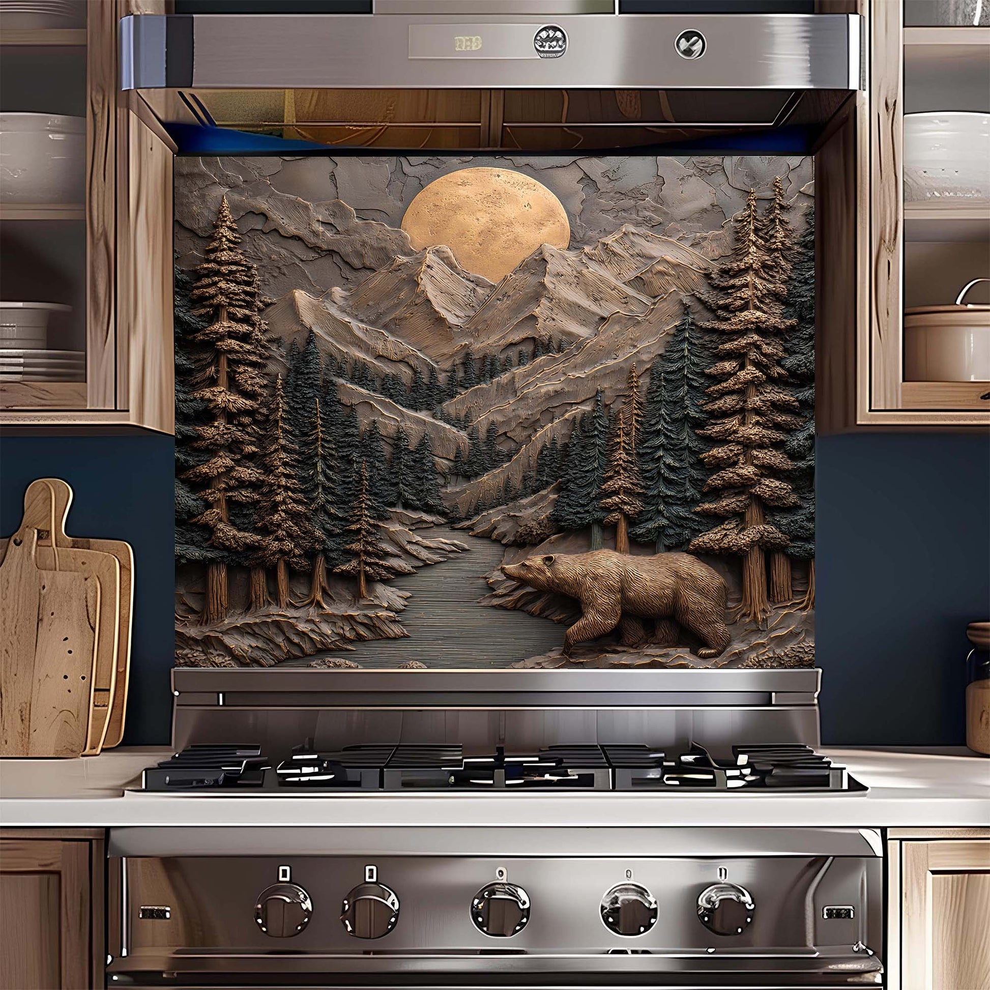 Stainless steel gas stove with a decorative backsplash featuring a bear and mountain scene.