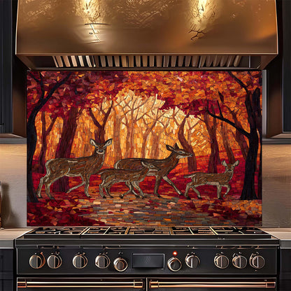 Stainless steel range hood with a decorative glass backsplash featuring deer in a forest design.