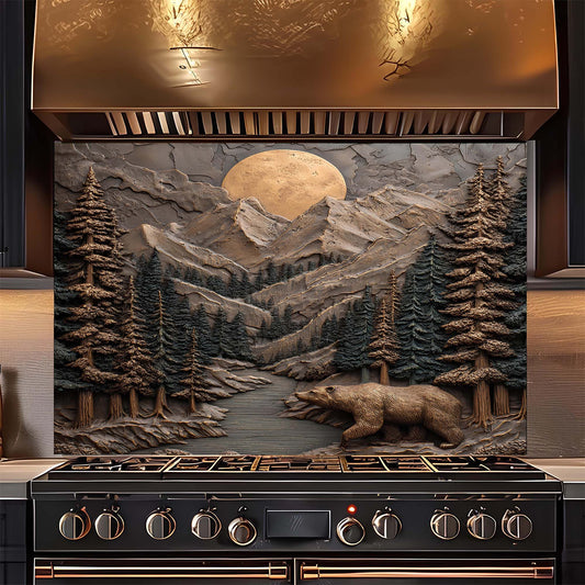 Stainless steel range hood with mountain and bear design kitchen backsplash above a stove.