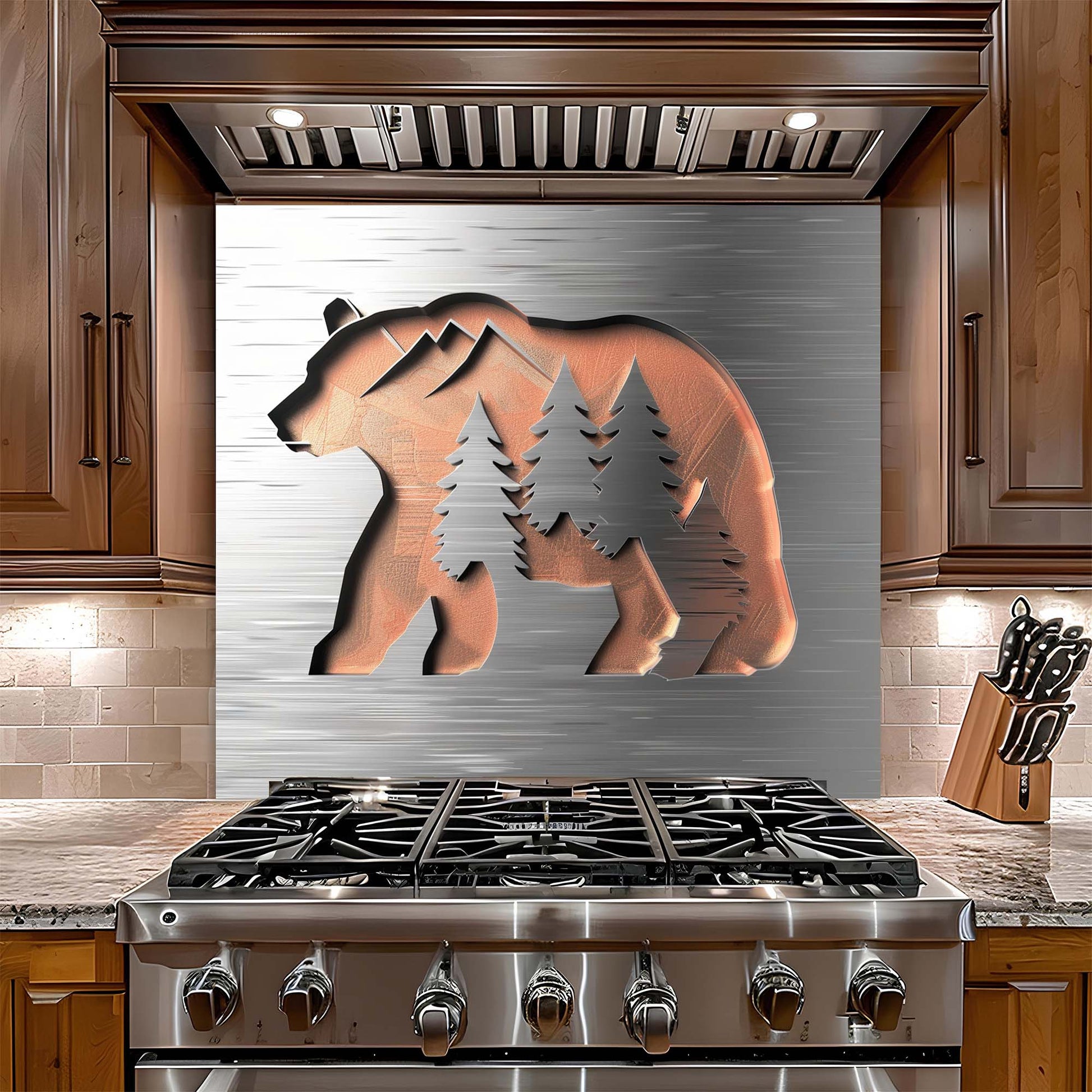 Stainless steel stove with bear and tree design on backsplash in a kitchen setting