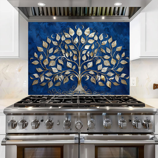 Stainless steel stove with decorative glass splashback featuring a tree design on a blue background.